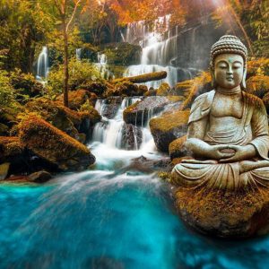 Fotobehang – Orient – landscape with Buddha sculpture on a background of a waterfall and exotic forest